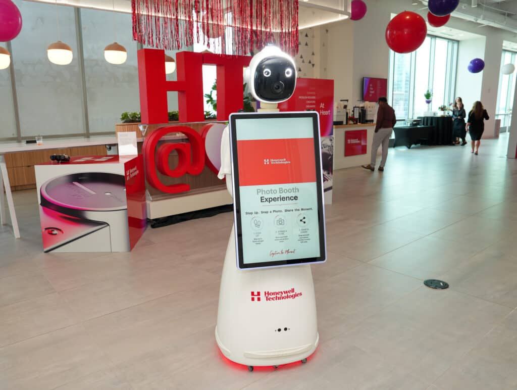 Rosie the AI Photo Booth Robot is posing at the Honeywell brand launch at the charlotte nc corporate office