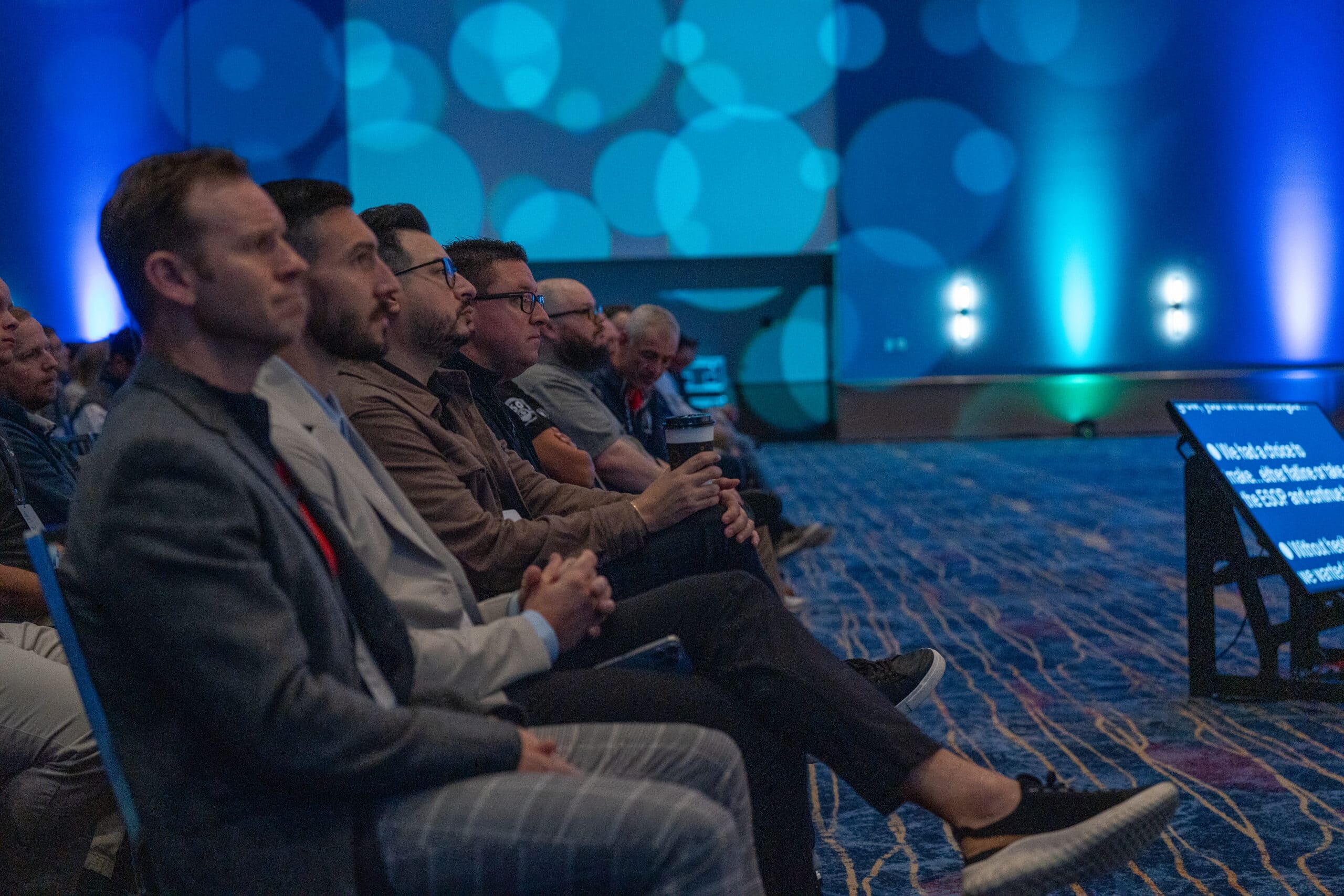 Guests Engaging at Corporate Event Booth