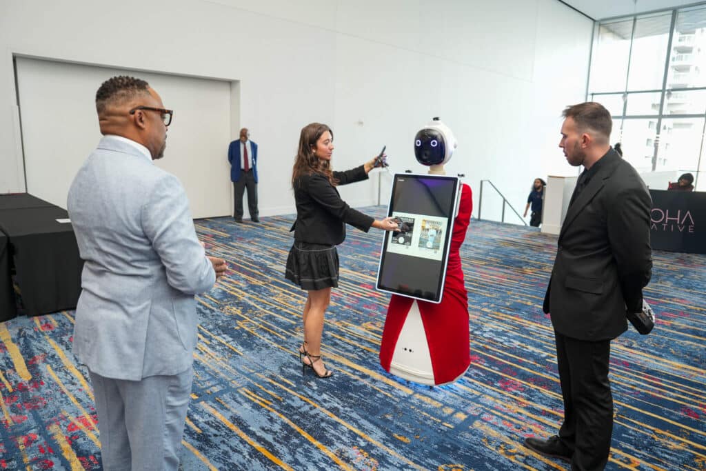 Rosie the Ai Photo Booth Robot is engaging with guest using ai technogly at the nascar hall of fame 2026 HTA gala.